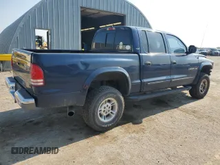 2000 Dodge Dakota Sport with VIN 1B7GG2AN8YS665678, listed as a Copart auction lot 63878554 with 92,470 mi miles and Salvage Title. Bid and sale history available at carsss.com. Image 3.