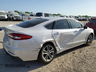 2020 Ford Fusion Titanium with VIN 3FA6P0RUXLR230201, listed as a Copart auction lot 52773875 with 72,788 mi miles and Salvage title. Bid and sale history available at DreamBid. Image 3.
