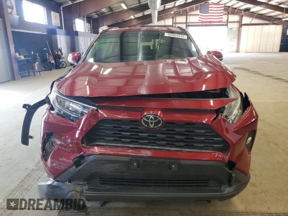 2019 Toyota RAV4 XLE with VIN JTMP1RFV8KD013013, listed as a Copart auction lot 50964245 with 70,656 mi miles and Salvage Title. Bid and sale history available at carsss.com. Image 5.