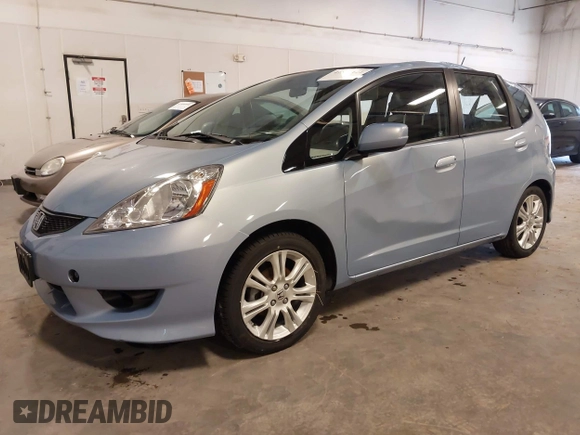 2009 Honda Fit Sport with VIN JHMGE88489S005033, listed as a IAAI auction lot 41861124 with 56,148 mi miles and . Bid and sale history available at DreamBid. Image 2.