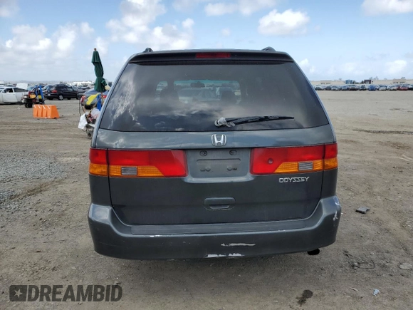 2004 Honda Odyssey EX-L with VIN 5FNRL18944B052617, listed as a Copart auction lot 51443625 with 144,346 mi miles and Salvage Title. Bid and sale history available at DreamBid. Image 6.