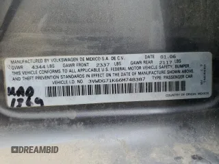 2006 Volkswagen Jetta z VIN 3VWDG71K66M748387, wystawiony jako Copart lot #55269553 z przebiegiem 141 937 mil mil oraz Czysty tytuł • Clean title. Historia ofert i sprzedaży dostępna na DreamBid. Obrazek 12.