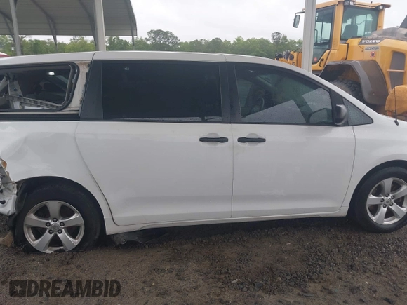 2014 Toyota Sienna L with VIN 5TDZK3DC9ES473780, listed as a IAAI auction lot 42245274 with 203,060 mi miles and . Bid and sale history available at DreamBid. Image 14.