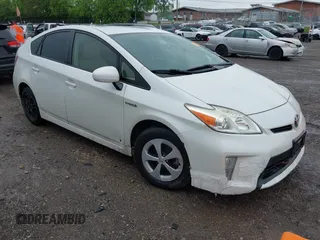 2015 Toyota Prius Four with VIN JTDKN3DU3F1882373, listed as a IAAI auction lot 42103396 with 240,242 mi miles. Bid and sale history available at carsss.com. Image 1.