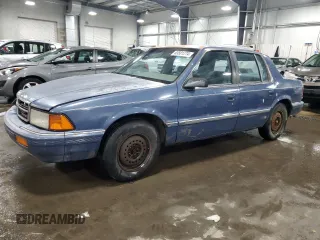 1991 Dodge Spirit z VIN 1B3XA46K9MF628235, wystawiony jako Copart lot #83581274 z przebiegiem 117 774 mil mil oraz Szkody całkowita. Historia ofert i sprzedaży dostępna na DreamBid. Obrazek 1.