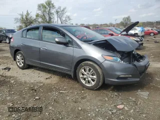 2011 Honda Insight EX with VIN JHMZE2H75BS008221, listed as a Copart auction lot 51910115 with 82,670 mi miles and Salvage Title. Bid and sale history available at DreamBid. Image 4.