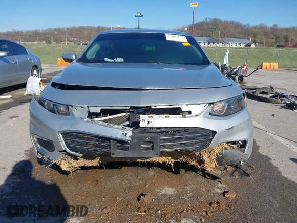 2018 Chevrolet Malibu LT z VIN 1G1ZD5ST1JF261841, wystawiony jako IAAI lot #41887177 z przebiegiem 128 213 mil mil oraz . Historia ofert i sprzedaży dostępna na DreamBid. Obrazek 13.
