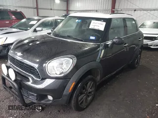 2014 MINI Countryman S with VIN WMWZC5C53EWP40677, listed as a IAAI auction lot 41473281 with 108,616 mi miles and . Bid and sale history available at DreamBid. Image 17.