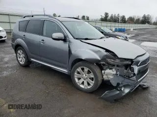2013 Mitsubishi Outlander SE z VIN JA4JT3AW4DU000656, wystawiony jako Copart lot #51808395 z przebiegiem 158 479 mil mil oraz Szkoda całkowita • Salvage title. Historia ofert i sprzedaży dostępna na DreamBid. Obrazek 4.