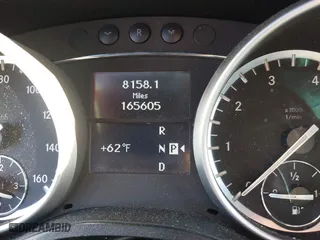 2011 Mercedes-Benz GL-Class GL 450 with VIN 4JGBF7BE1BA752615, listed as a IAAI auction lot 41075508 with 165,605 mi miles. Bid and sale history available at carsss.com. Image 7.