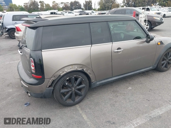 2013 MINI Clubman z VIN WMWZF3C56DT490749, wystawiony jako IAAI lot #42368888 z przebiegiem 163 731 mil mil oraz . Historia ofert i sprzedaży dostępna na DreamBid. Obrazek 4.