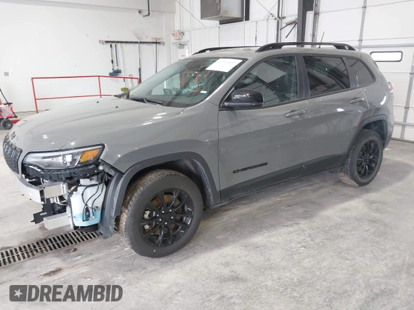 2023 Jeep Cherokee Altitude Lux with VIN 1C4PJMMBXPD115299, listed as a IAAI auction lot 41992492 with 60,232 mi miles. Bid and sale history available at carsss.com. Image 18.