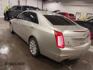 2014 Cadillac CTS Luxury AWD with VIN 1G6AX5S3XE0197628, listed as a IAAI auction lot 41400988 with 144,026 mi miles and . Bid and sale history available at DreamBid. Image 3.