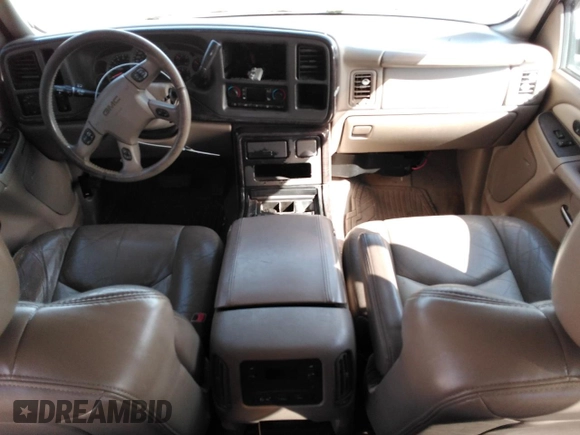 2005 GMC Sierra Denali z VIN 2GTEK63NX51184417, wystawiony jako Copart lot #55663955 z przebiegiem 201 401 mil mil oraz Tytuł czysty. Historia ofert i sprzedaży dostępna na DreamBid. Obrazek 8.
