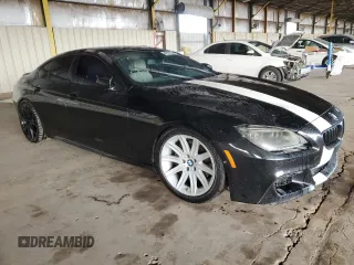 2014 BMW 6 Series 650i z VIN WBA6B2C56ED129901, wystawiony jako Copart lot #41619755 z przebiegiem 131 208 mil mil oraz Czysty tytuł • Clean title. Historia ofert i sprzedaży dostępna na DreamBid. Obrazek 4.