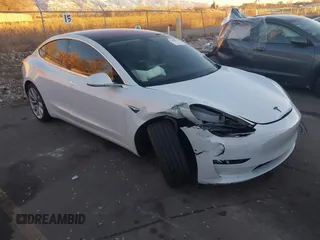 2018 Tesla Model 3 Long Range Battery z VIN 5YJ3E1EB4JF067895, wystawiony jako IAAI lot #41280101 z przebiegiem Nie podano mil oraz . Historia ofert i sprzedaży dostępna na DreamBid. Obrazek 1.