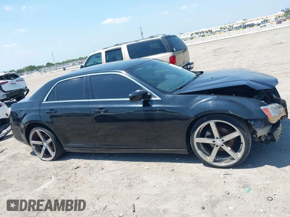 2012 Chrysler 300 with VIN 2C3CCAAG3CH112592, listed as a IAAI auction lot 42070481 with 178,980 mi miles. Bid and sale history available at carsss.com. Image 13.