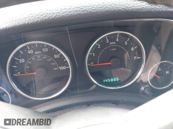 2014 Jeep Wrangler Unlimited Rubicon with VIN 1C4BJWFG2EL264792, listed as a IAAI auction lot 40938380 with 145,886 mi miles. Bid and sale history available at carsss.com. Image 7.