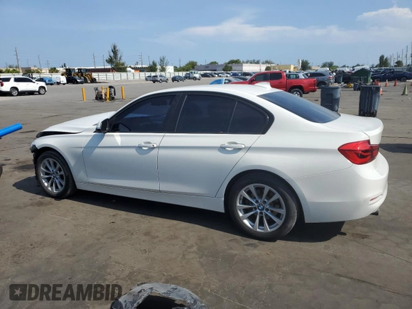 2018 BMW 3 Series 320i xDrive with VIN WBA8A3C55JA357532, listed as a Copart auction lot 57561015 with 46,876 mi miles and Salvage title. Bid and sale history available at DreamBid. Image 2.