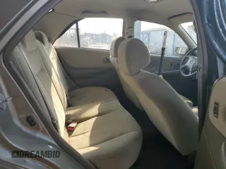 1999 Mazda Protege DX z VIN JM1BJ2223X0137153, wystawiony jako Copart lot #87899735 z przebiegiem 154 209 mil mil oraz Szkoda całkowita • Salvage title. Historia ofert i sprzedaży dostępna na DreamBid. Obrazek 11.
