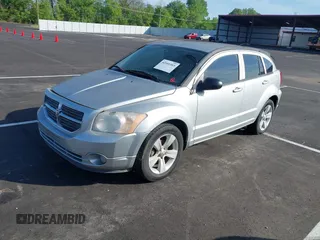 2011 Dodge Caliber Mainstreet with VIN 1B3CB3HA2BD117839, listed as a IAAI auction lot 42101103 with 142,099 mi miles. Bid and sale history available at carsss.com. Image 2.