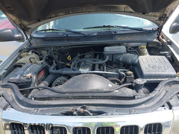 2003 Jeep Grand Cherokee Laredo with VIN 1J4GW48S83C558962, listed as a IAAI auction lot 42415803 with 312,419 mi miles and . Bid and sale history available at DreamBid. Image 10.