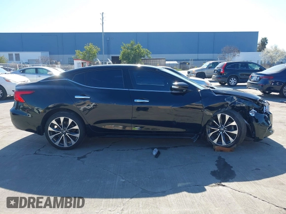 2016 Nissan Maxima SL with VIN 1N4AA6AP9GC448087, listed as a IAAI auction lot 41828781 with 99,436 mi miles and . Bid and sale history available at DreamBid. Image 13.