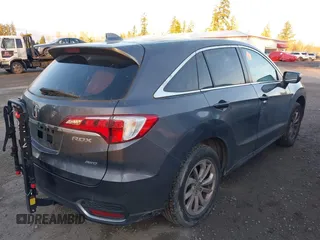 2018 Acura RDX w/Technology Pkg with VIN 5J8TB4H57JL021122, listed as a IAAI auction lot 41524097 with 80,753 mi miles. Bid and sale history available at carsss.com. Image 4.