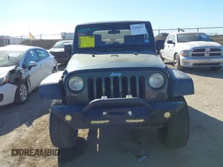 2007 Jeep Wrangler X with VIN 1J8FA24197L205095, listed as a IAAI auction lot 41388452 with 127,051 mi miles and . Bid and sale history available at carsss.com. Image 12.