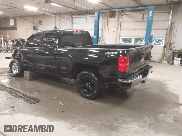 2015 Chevrolet Silverado 1500 LT with VIN 1GCVKREC2FZ417244, listed as a IAAI auction lot 41267554 with 87,735 mi miles and . Bid and sale history available at DreamBid. Image 3.