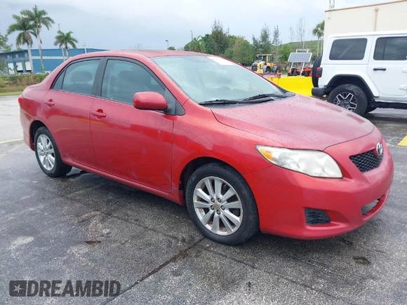 2009 Toyota Corolla with VIN 1NXBU40E39Z022074, listed as a IAAI auction lot 41987902 with 121,206 mi miles. Bid and sale history available at carsss.com. Image 1.