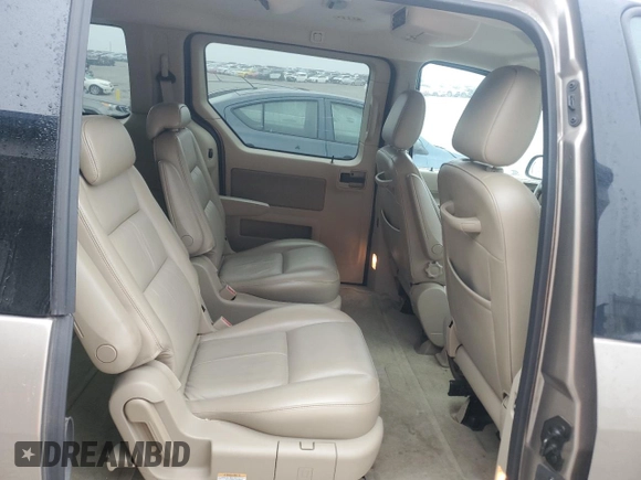 2005 Ford Freestar z VIN 2FMZA57215BA15987, wystawiony jako Copart lot #66308294 z przebiegiem 95 515 mil mil oraz Szkoda całkowita • Salvage title. Historia ofert i sprzedaży dostępna na DreamBid. Obrazek 11.
