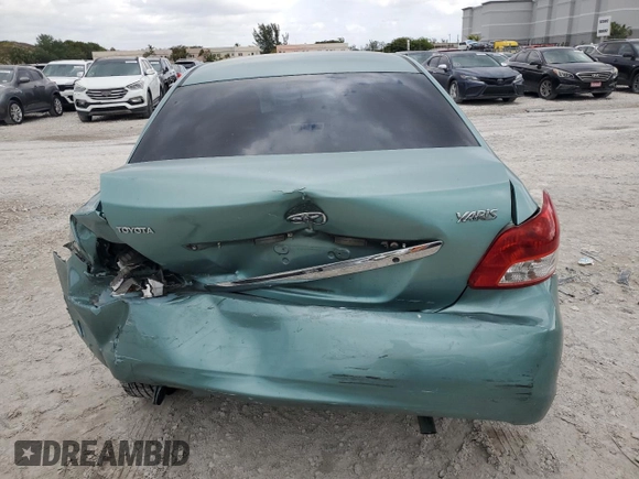 2007 Toyota Yaris with VIN JTDBT923271052472, listed as a Copart auction lot 50942975 with 147,363 mi miles and Salvage Title. Bid and sale history available at DreamBid. Image 6.