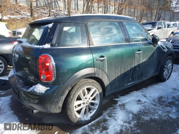2013 MINI Countryman with VIN WMWZB3C53DWM08700, listed as a IAAI auction lot 41402093 with 71,109 mi miles and . Bid and sale history available at DreamBid. Image 4.