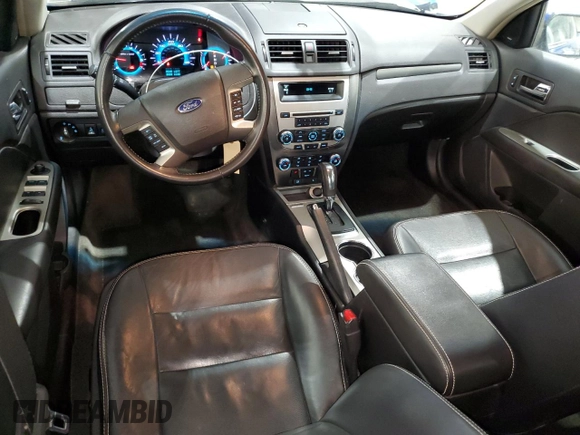 2012 Ford Fusion SEL z VIN 3FAHP0JA5CR210559, wystawiony jako Copart lot #55126185 z przebiegiem 130 990 mil mil oraz Szkody całkowita. Historia ofert i sprzedaży dostępna na DreamBid. Obrazek 8.