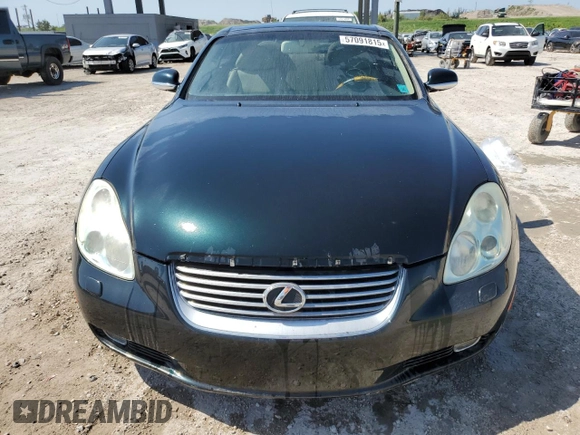 2003 Lexus SC 430 z VIN JTHFN48Y930048533, wystawiony jako Copart lot #57091815 z przebiegiem Nie podano mil oraz Szkoda całkowita • Salvage title. Historia ofert i sprzedaży dostępna na DreamBid. Obrazek 5.