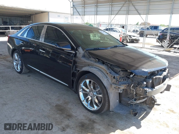 2013 Cadillac XTS Premium z VIN 2G61S5S36D9128244, wystawiony jako IAAI lot #41976485 z przebiegiem 88 033 mil mil oraz . Historia ofert i sprzedaży dostępna na DreamBid. Obrazek 1.