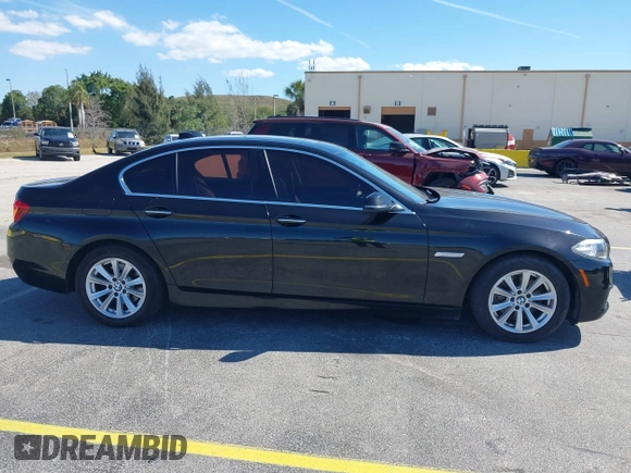 2015 BMW 5 Series 528i xDrive with VIN WBA5A7C58FG144069, listed as a IAAI auction lot 41854112 with 136,403 mi miles and . Bid and sale history available at DreamBid. Image 13.