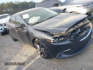 2016 Mazda 6 i Grand Touring с VIN JM1GJ1W51G1441631, выставлен на аукционе IAAI как лот 41870565 с пробегом 153 439 миль миль и . История ставок и продаж доступна на DreamBid. Изображение 1.