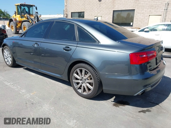 2014 Audi A6 3.0T Prestige with VIN WAUHGAFC9EN028196, listed as a IAAI auction lot 41993806 with 100,215 mi miles. Bid and sale history available at carsss.com. Image 3.