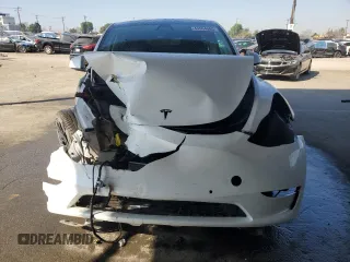 2022 Tesla Model Y Performance with VIN 7SAYGDEF8NF381644, listed as a Copart auction lot 44554585 with 71,413 mi miles and Salvage Title. Bid and sale history available at DreamBid. Image 5.