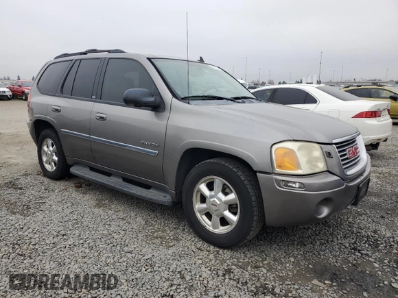2006 GMC Envoy SLT with VIN 1GKDS13S962138197, listed as a Copart auction lot 85679094 with 166,376 mi miles and Salvage Title. Bid and sale history available at carsss.com. Image 4.