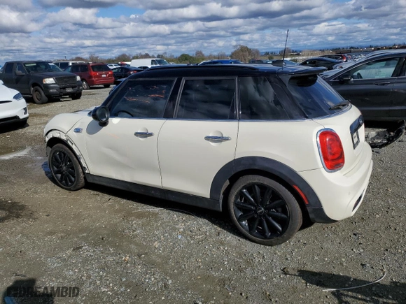 2019 MINI Hardtop 4 Door Cooper S with VIN WMWXU3C51K2H88452, listed as a Copart auction lot 44001965 with 64968 miles and Salvage Title. Bid and sale history available at carsss.com. Image 2.
