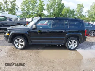 2015 Jeep Patriot Latitude with VIN 1C4NJPFB7FD178770, listed as a IAAI auction lot 42546578 with 130,429 mi miles and . Bid and sale history available at DreamBid. Image 14.