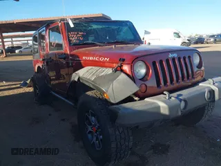 2010 Jeep Wrangler Unlimited Rubicon with VIN 1J4BA6H14AL110534, listed as a IAAI auction lot 41382867 with 246,087 mi miles and . Bid and sale history available at DreamBid. Image 6.