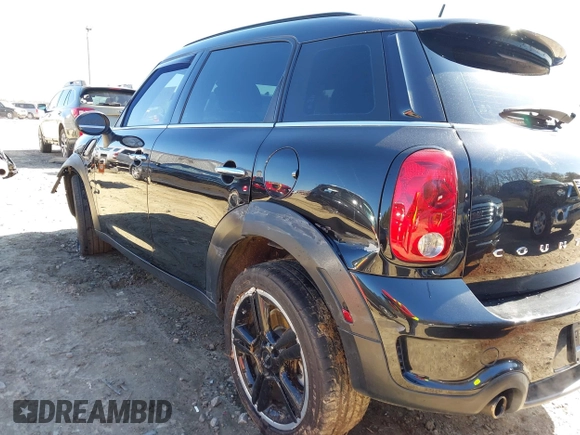 2015 MINI Countryman S with VIN WMWZC3C5XFWT04916, listed as a IAAI auction lot 41636369 with 101,448 mi miles and . Bid and sale history available at DreamBid. Image 17.