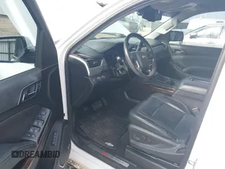 2017 Chevrolet Tahoe LT with VIN 1GNSKBKCXHR350028, listed as a IAAI auction lot 41684954 with 117,261 mi miles and . Bid and sale history available at DreamBid. Image 20.