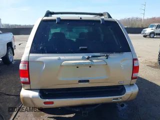 2002 Nissan Pathfinder SE z VIN JN8DR09Y82W717024, wystawiony jako IAAI lot #41819237 z przebiegiem 216 760 mil mil oraz . Historia ofert i sprzedaży dostępna na DreamBid. Obrazek 16.