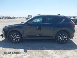 2018 Mazda CX-5 Grand Touring with VIN JM3KFADM8J0330035, listed as a IAAI auction lot 41878680 with 62,632 mi miles. Bid and sale history available at carsss.com. Image 15.