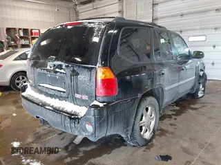 2007 GMC Envoy SLE with VIN 1GKDT13S472123167, listed as a IAAI auction lot 41385620 with 157,680 mi miles. Bid and sale history available at carsss.com. Image 4.